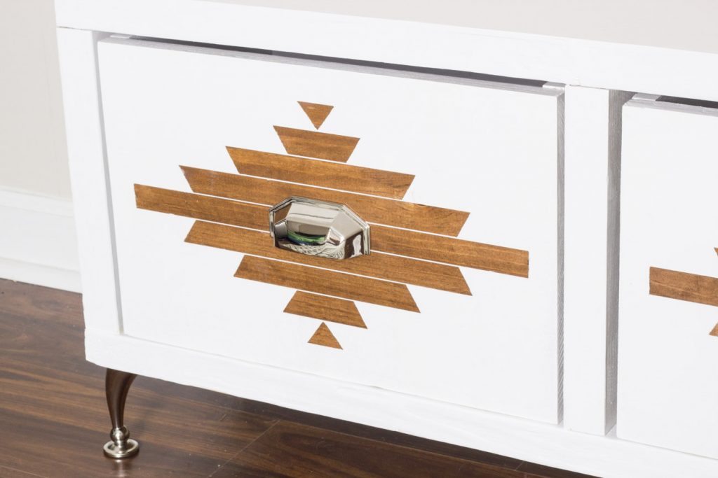 Learn how to build this DIY storage bench with an Aztec inspired design!