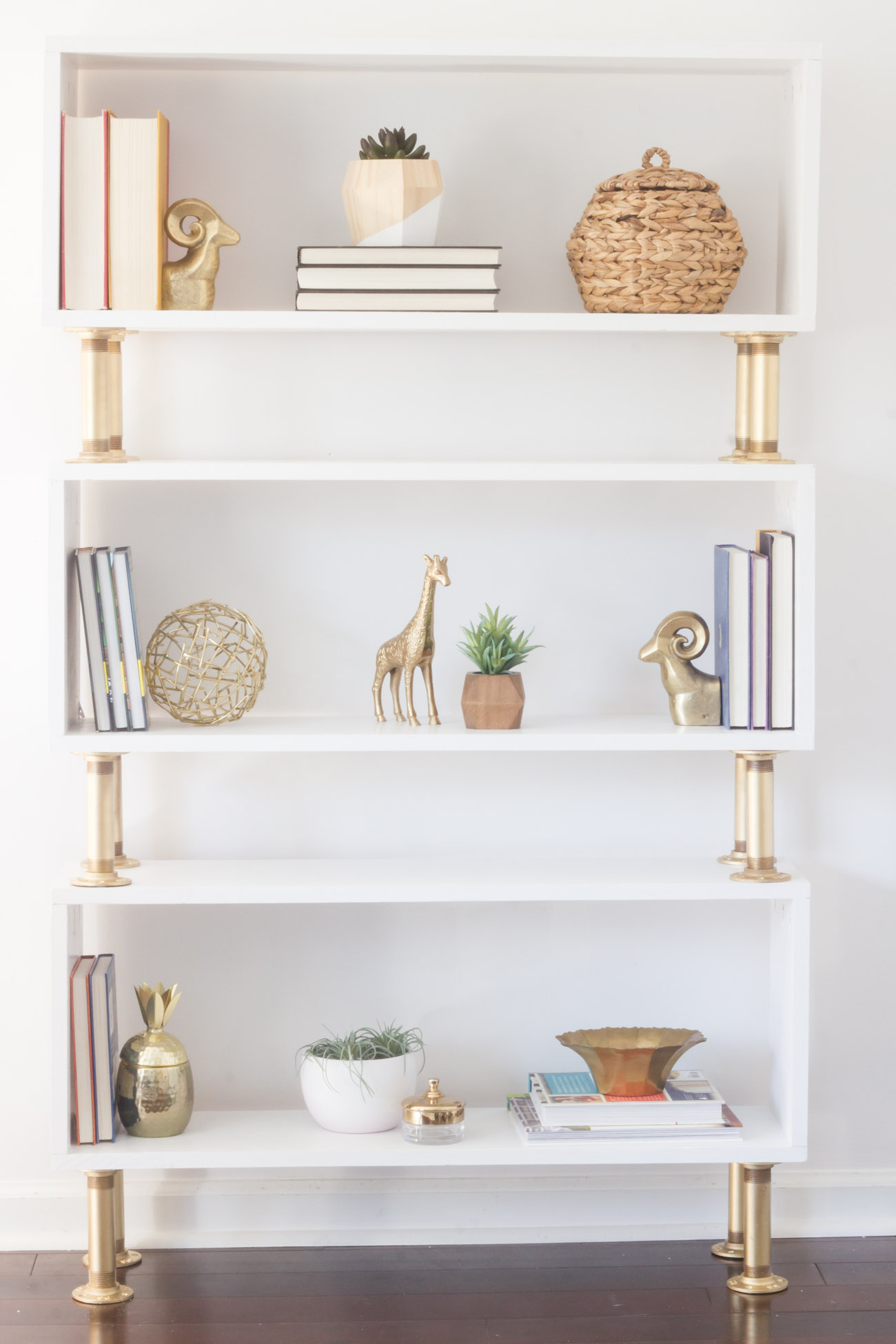 DIY Pipe Bookshelf (with a Modern "Glam" Spin on Industrial Style