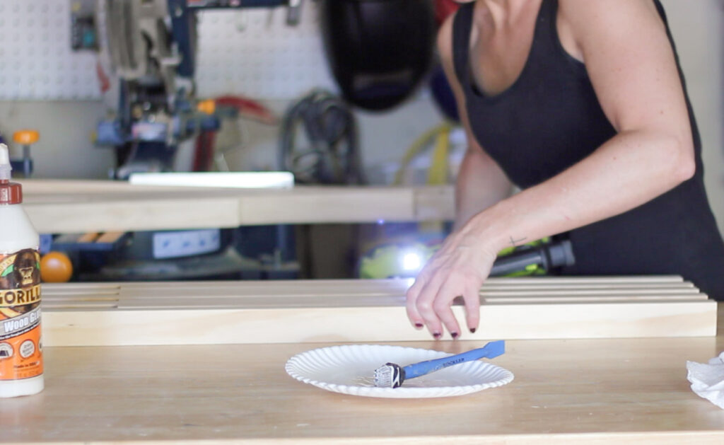 Erin Spain building a DIY slatted coffee table.