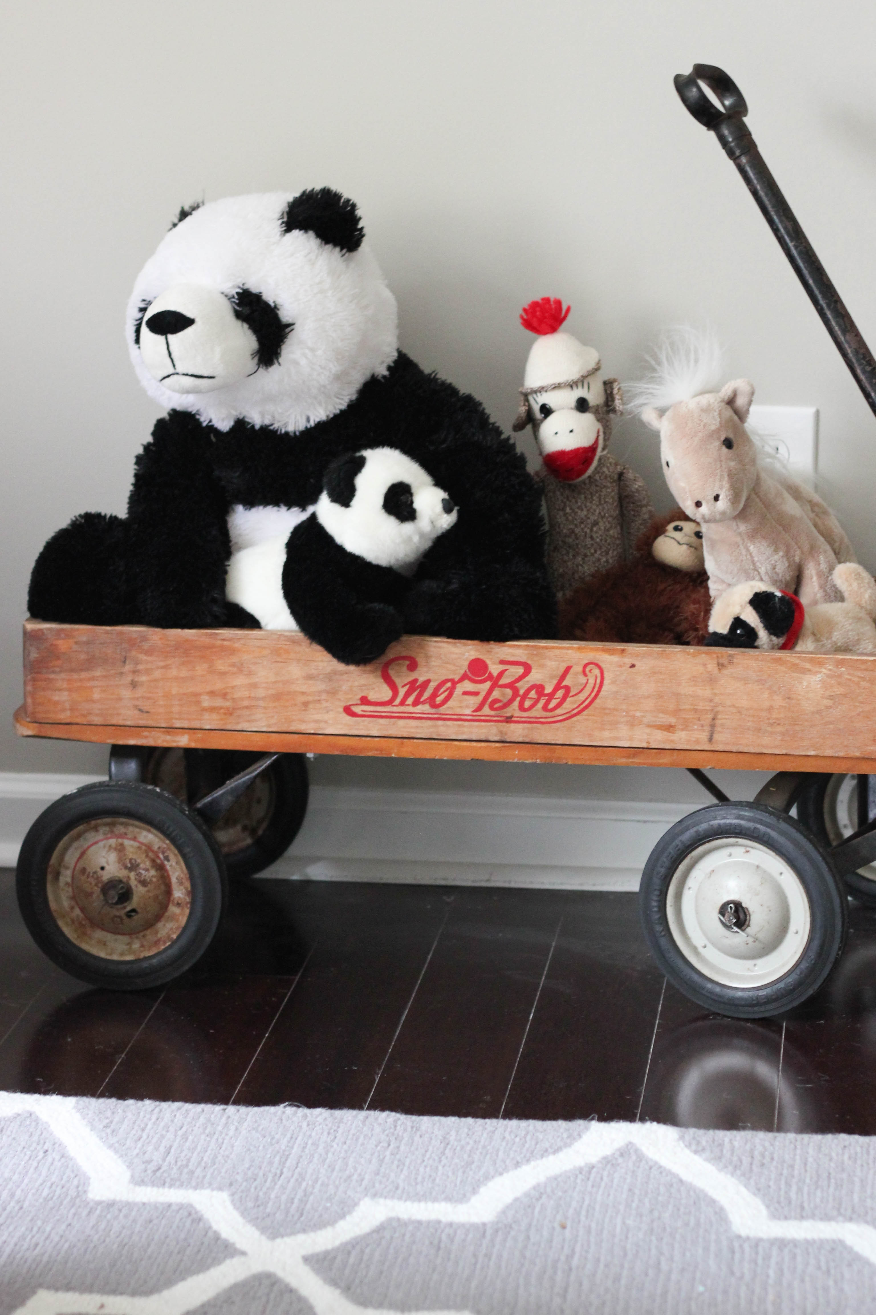 This antique wagon is a family heirloom, and I loved styling it in our nursery!