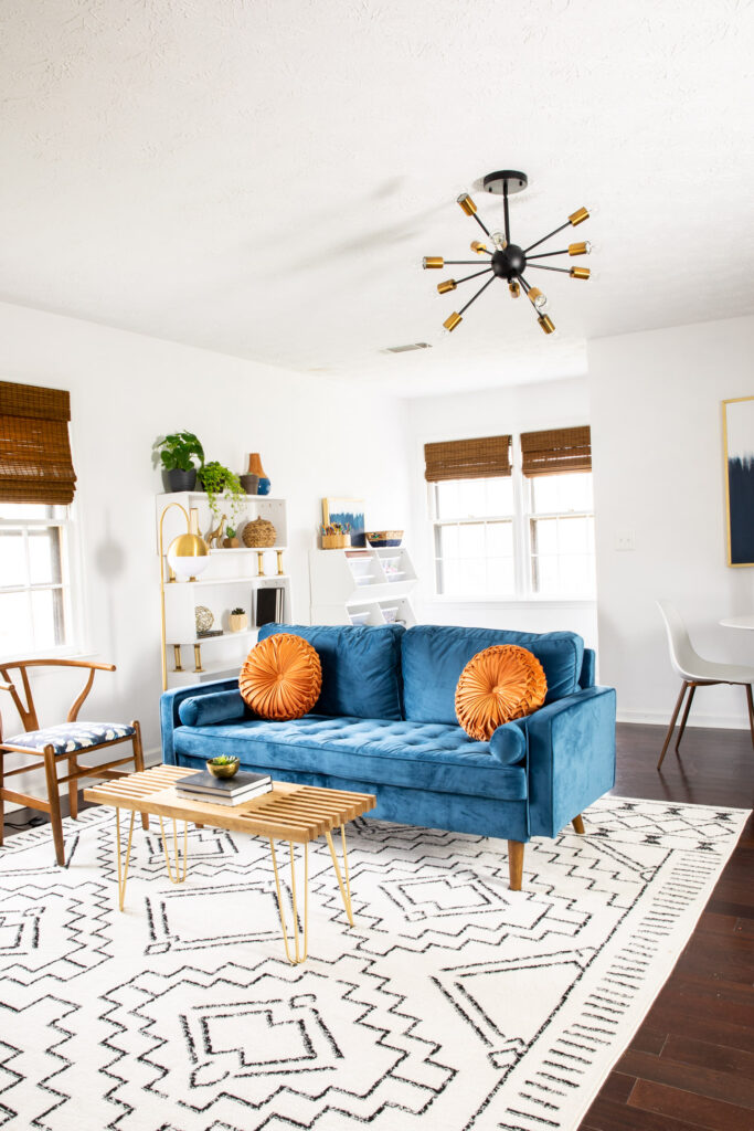 Blue sofa in modern teen hangout room.